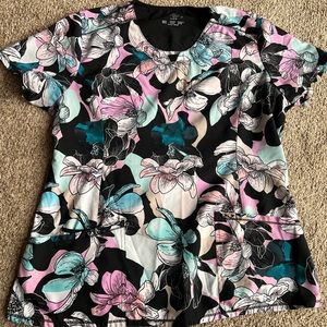Woman’s Cherokee Infinity floral scrub top, size Large